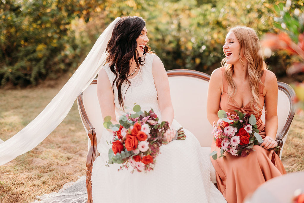 21 Petals bride and bridesmaid holding fall wedding bouquets