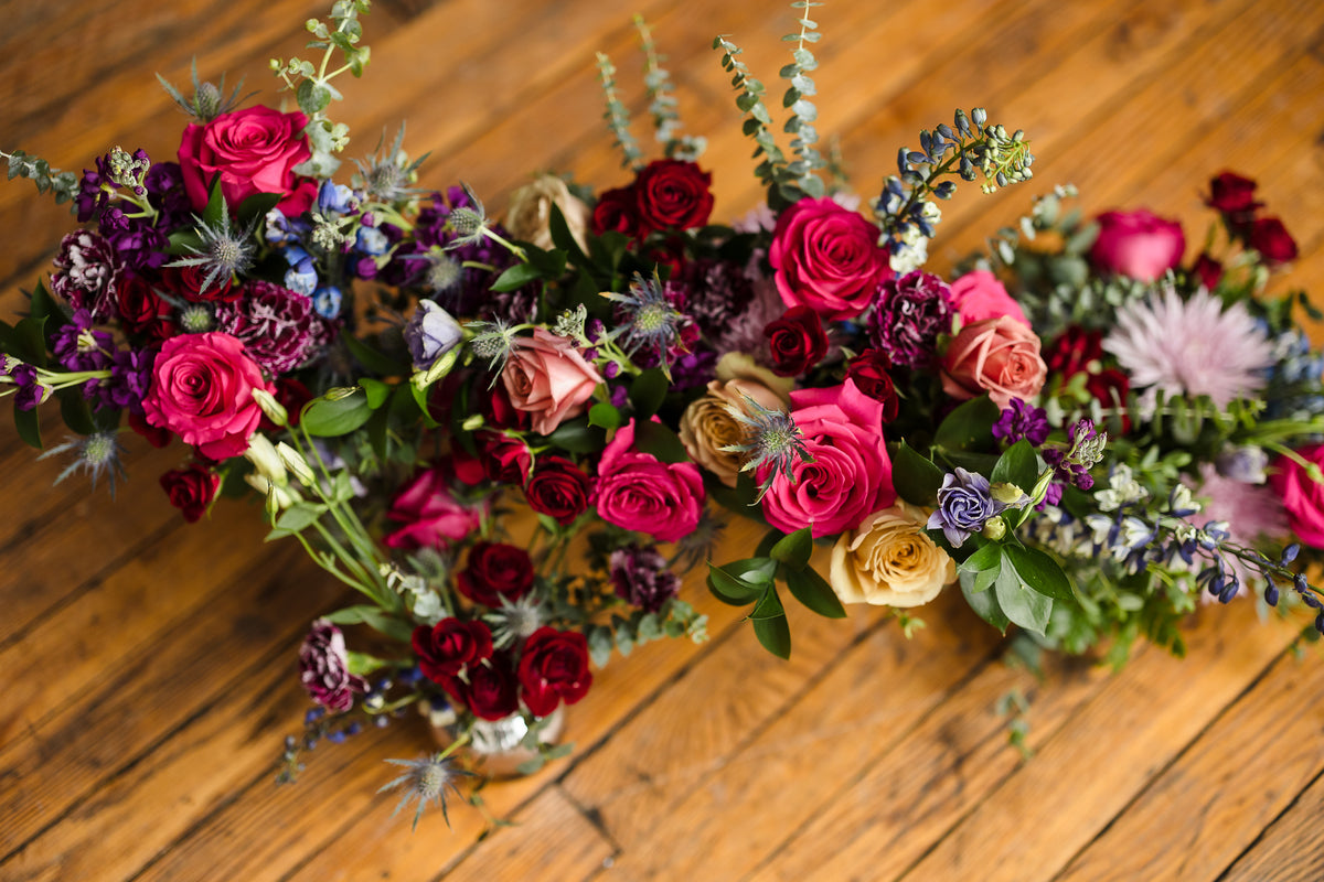 Jewel-tone wedding flower arrangements