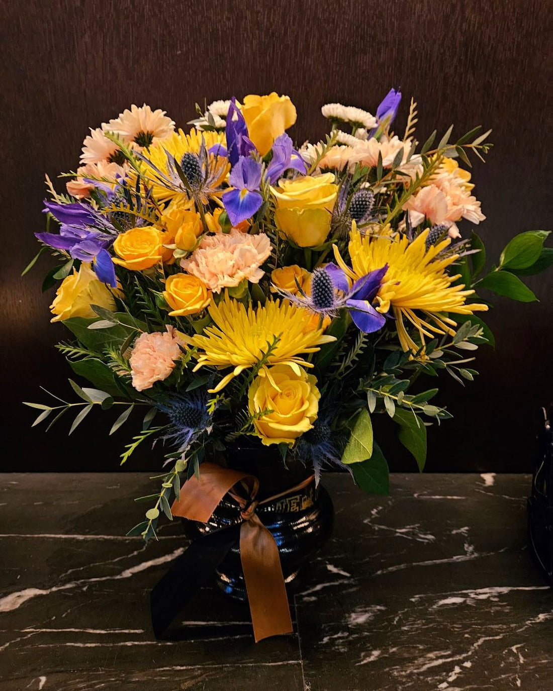 Gold and purple Purdue-inspired flower arrangement from 21 Petals