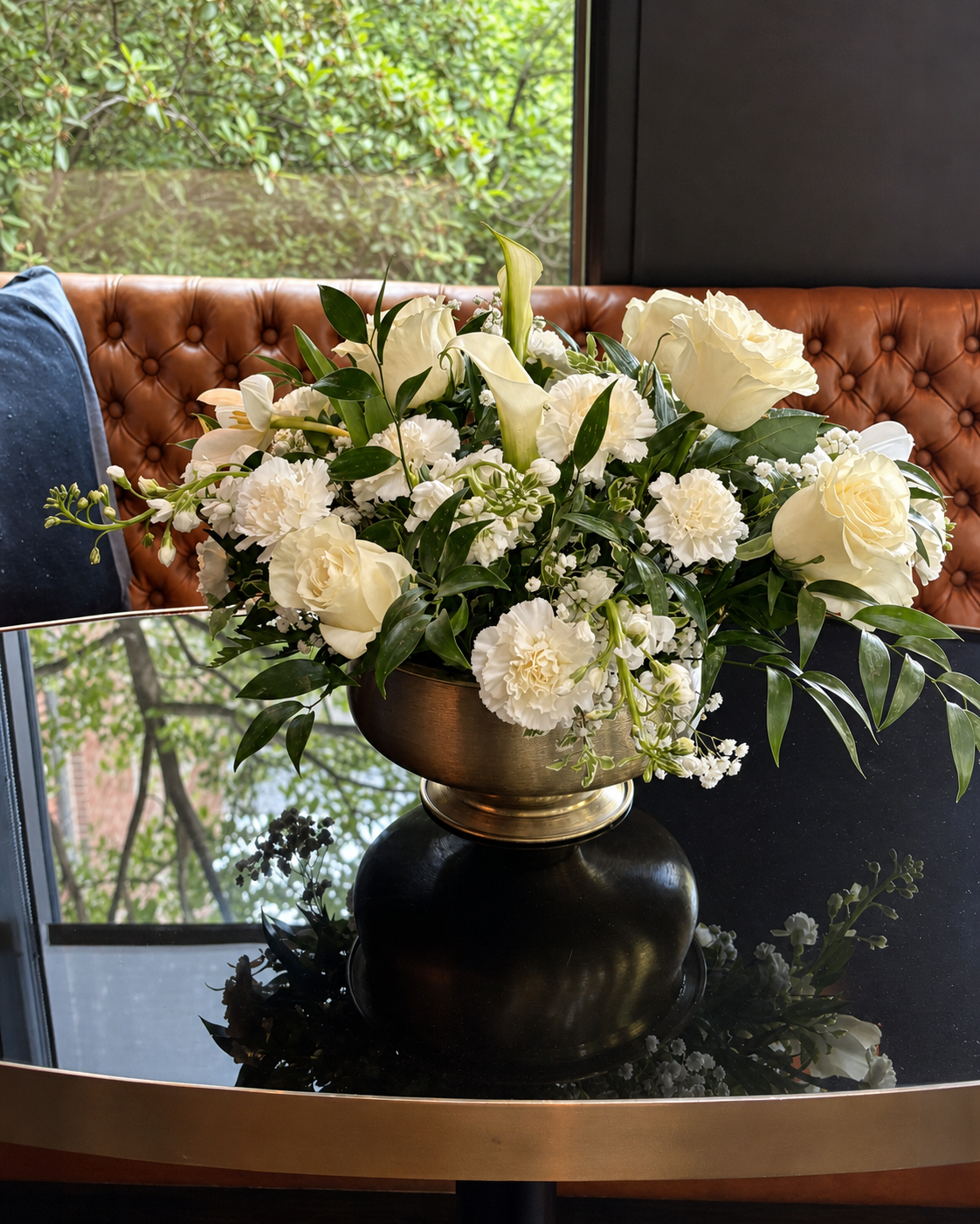 White roses, calla lilies and greenery in a gold bowl, designed by 21 Petals for Purdue graduation at the Union Club Hotel